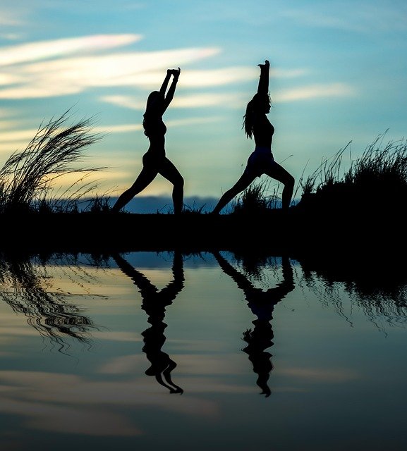 women, yoga, silhouettes, water, reflection, mirroring, water reflection, pose, posing, yoga pose, meditation, stretching, wellness, well-being, exercise, adults, nature, asia, girls, morning, outdoors, pair, people, stance, sunrise, sunset